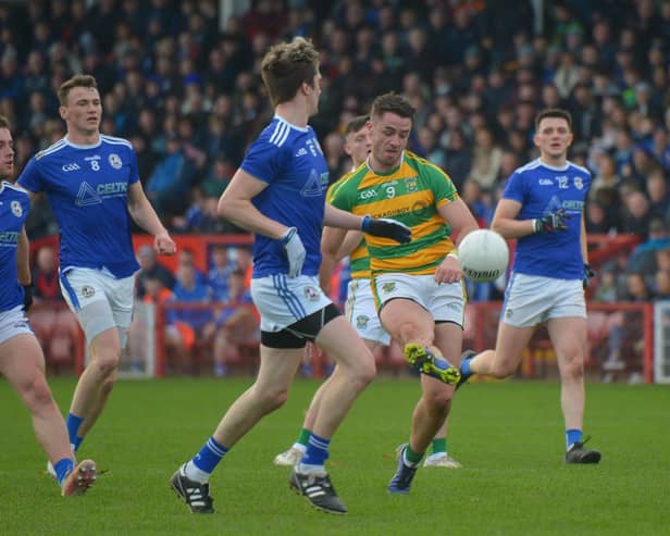 Neil McNicholl scores a first half point for Glenullin against Galbally Pearses. (Photo: George Sweeney)