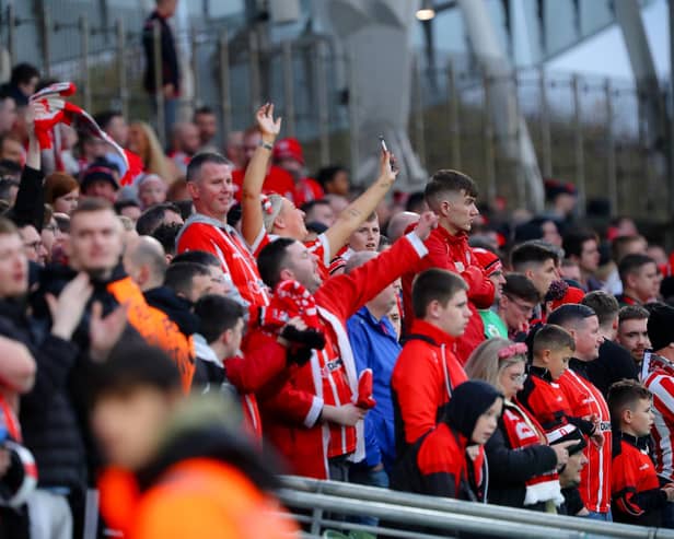 Derry City fans were in fine voice inside the Aviva Stadium but trouble broke out at the Shelbourne end after flares were thrown onto the pitch,
