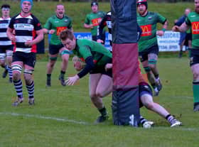 City of Derry ‘s David Lapsley scores a first half try against Cooke at Judges Road. (Photo: George Sweeney).