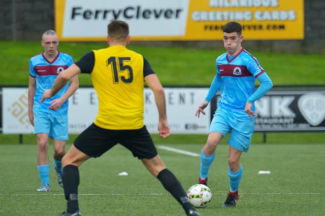 Midfielder Orrin McLaughlin fired home Institute's fourth goal against Annagh United.