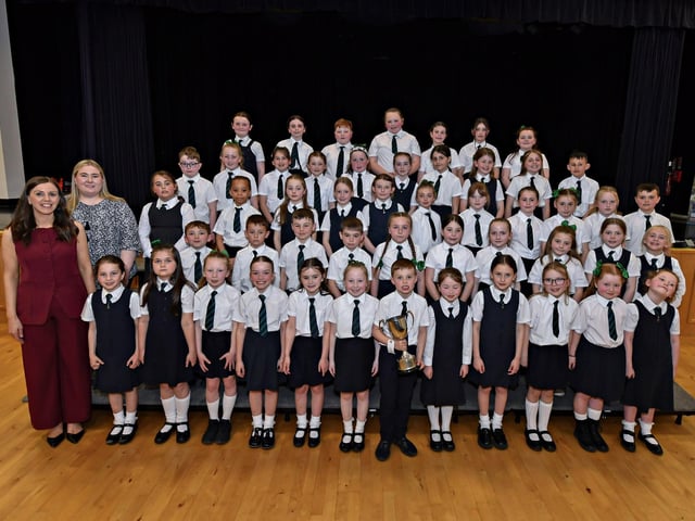 Sacred Heart Primary School’s Irish Language Choir, winners of the Knights of St Columbanus Feis Cup and Bursary at the Feis Dhoire Cholmcille Choral Competitions held in St Mary’s College. Included in the photograph are Miss Dunn and Miss Bowen. Photo: George Sweeney