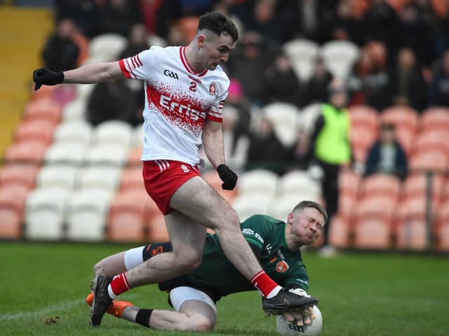 Armagh keeper Blaine Hughes makes a crucial first half save against Derry's Diarmuid Baker in the Athletic Grounds on Saturday. (Photo: John Merry)