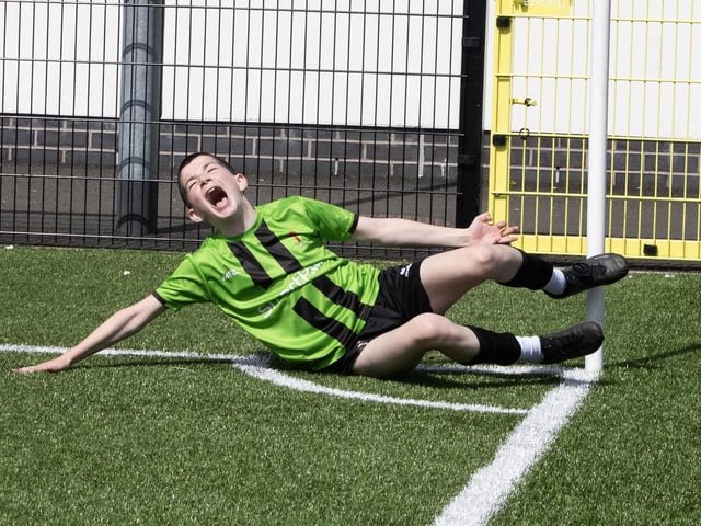 Liam Gallagher celebrates the opening score in style during Thursday's final.