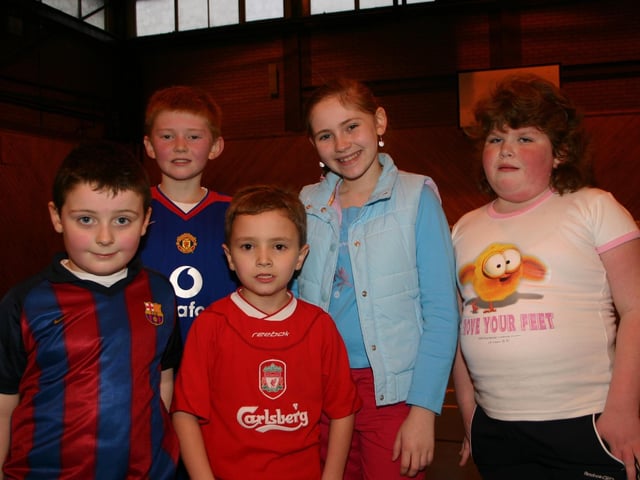 Evan Duffy, Matthew McCann, Aidan Dunne, Amy McCann and CarolAnn Dunne  enjoying the game at Brooke Park. 2154/dd : Parties and celebrations January 2006: Aidan Dunne.