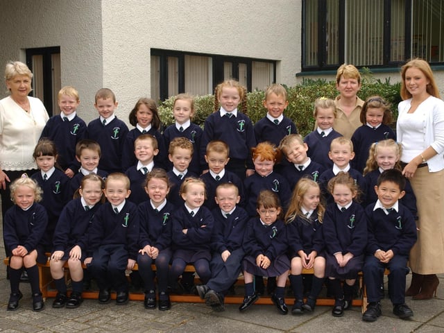 Primary 1 pupils from Good Shepard Primary School pictured with, from left, Pamela Connell, classroom assistant, Bernie Dooley, classroom assistant, and Deborah Chambers, class teacher. (1909PG05):20 years on: Young people across Derry and Donegal starting school in September 2003
