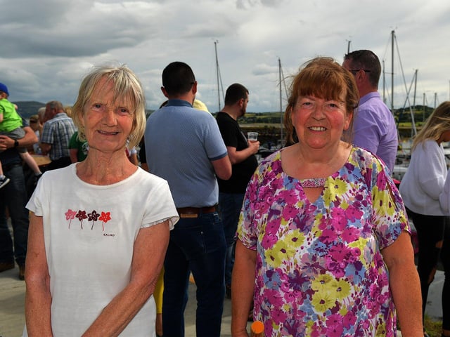 Caroline Greenhalgh, from Manchester with her sister Pearl Fair, from Fahan at the blessing of the boats at the Fahan Marina on Sunday afternoon. Photo: George Sweeney. DER2326GS - 22