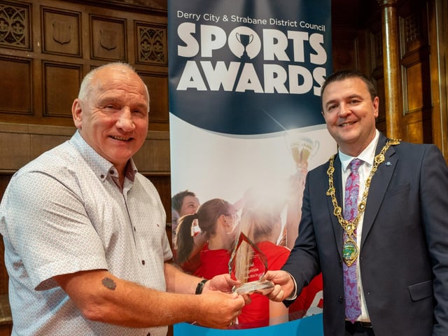 The Mayor Councillor, Ruairí McHugh, presents Olympic boxing referee Ben McGarrigle from Mourne Golden Gloves, Strabane, with a Special Recognition Award, as he hosted the annual Derry City and Strabane District Council Sports Awards in the Guildhall. Picture Martin McKeown. 05.06.25
