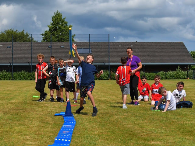 Throwing a ‘rocket’ competition during at the Holy Child Primary School sports day held on Monday last. Photo: George Sweeney. DER2325GS – 004