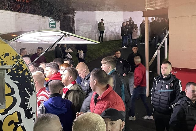 Derry City fans refuelling at the chip van at Richmond Park.