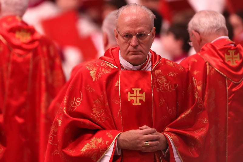 Cardinal Péter Erdő, Metropolitan Archbishop of Esztergom-Budapest, was born in Budapest on 25 June 1952, the first of six children in a family of Catholic intellectuals. He was ordained priest on 18 June 1975 in Budapest. Between 1975-1977 he served in a parish in the city of Dorog. His prodigious systematic reading has led to the publication of more than 250 articles and 25 books in the fields of Canon Law and the medieval history of Canon Law. He has also published a number of cultural and spiritual works. (Photo by Franco Origlia/Getty Images)