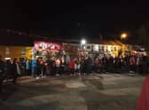 Some of those who gathered at the vigil for Creeslough in Carndonagh.