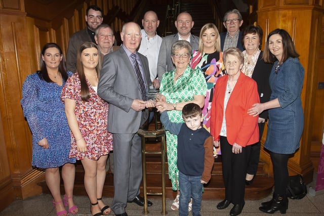 Ursula Melaugh pictured at the Guildhall, Derry with her family on Tuesday evening after receiving a presentation from the Mayor Sandra Duffy. 