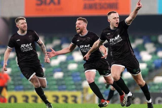 Ardmore's Oran Armstrong wheels away to celebrate after firing the Derry club in front in extra-time against Enniskillen Town United at Windsor Park. (Photo: IFA)