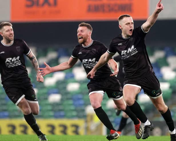 Ardmore's Oran Armstrong wheels away to celebrate after firing the Derry club in front in extra-time against Enniskillen Town United at Windsor Park. (Photo: IFA)