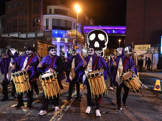 Derry’s ‘City of the Bones’ Halloween carnival parade makes its way along Strand Road on Friday evening. Photo: George Sweeney