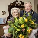 Mayor of Causeway Coast and Glens, Councillor Steven Callaghan joins Dorothy Cunningham to celebrate her 102nd birthday.