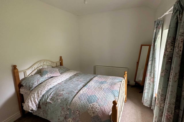 This beautifully maintained and modernised 2-storey, 3 bedroom farmhouse stands on a one acre site with Outbuildings and Sheds at Tullymore halfway between Malin Village and Malin Head only 5 minutes from Five Fingers Strand . The house which is part of an overall farm of 33 acres is being sold as a separate unit and is in excellent condition having been modernised yet retains many original features. The property, built around 80 years ago, has Bangor blue slates, pebble dash render, three spacious bedrooms, dual central heating, modern kitchen and spacious living room.