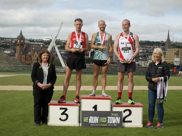 Mayor of Derry Cllr. Patricia Logue and Mags Matheson pictured with male podium finishers, Gavin McGlinchey (third), Kyle Doherty (first) and Noel McNally (second).