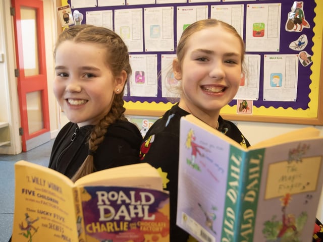 Roald Dahl fans Annie Gallagher and Abbie Buchanan celebrate World Book Day at Hollybush PS on Thursday with their favourite author Roald Dahl. (Photos: Jim McCafferty Photography)