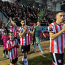 Derry City players make their way onto the pitch for the game against Drogheda United. Photograph: George Sweeney