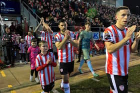 Derry City players make their way onto the pitch for the game against Drogheda United. Photograph: George Sweeney