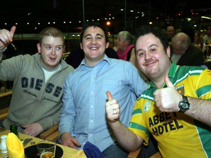 Happy punters Tony Gallagher, Martin Magee and Darren Giles enjoy a night at the races 0036/JML : .