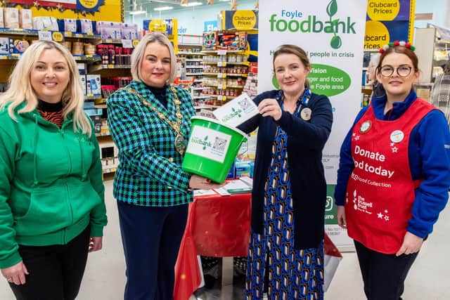 Derry City and Strabane District Council Mayor, Councillor Sandra Duffy popped into Quayside Shopping to launch the Tesco Food Drive and encourage people to donate food and scan Foyle Foodbank’s QR code. Included are Nora O’Donnell. Store Manager, Karen Mullan, Strategic Development Officer, Foyle Foodbank and Fionnuala O’Reilly, Tesco Community Champion. Picture Martin McKeown. 01.12.22