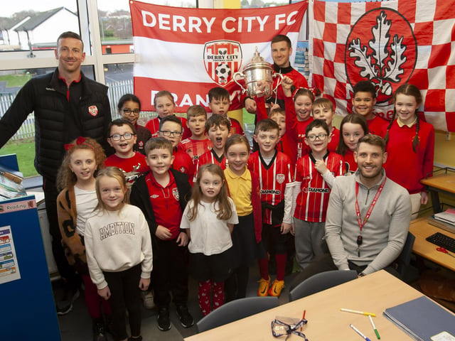 Mr. Lowry and his P5 class welcome Patrick and Shane McEleney and the FAI Cup to Steelstown Primary School.