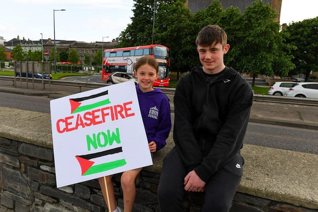 People gather for a Vigil for Gaza held on the Peace Bridge on Friday Evening, organised by the Derry Irish Palestinian Solidarity Campaign. Photo: George Sweeney