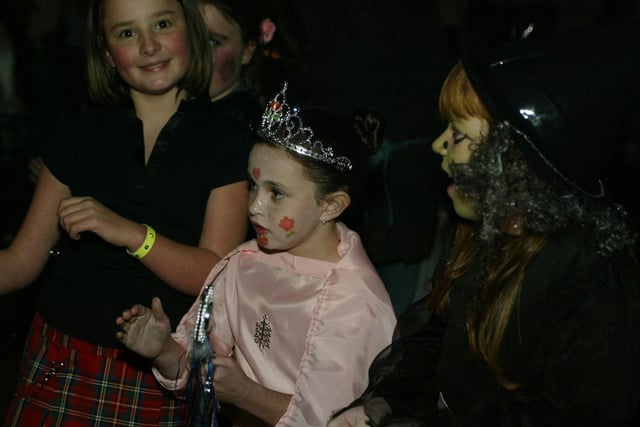 Young people boogying at a Halloween Disco in 2003