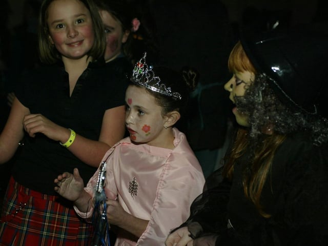 Young people boogying at a Halloween Disco in 2003