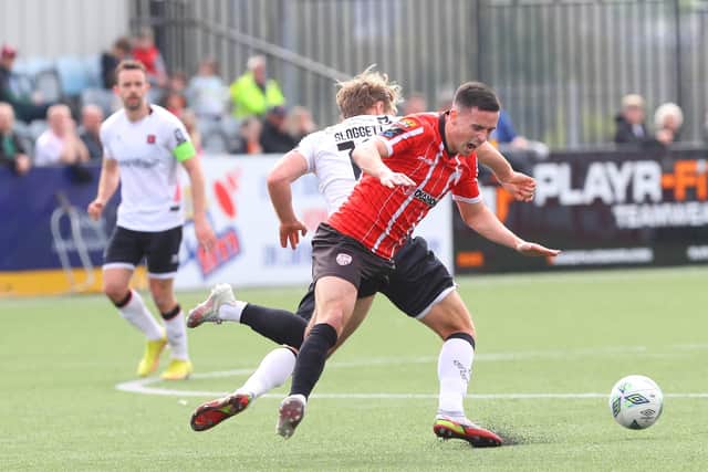 Dundalk's Greg Sloggett and Derry City's Jordan McEneff clash at Oriel Park. Photo by Kevin Moore.