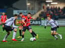 Derry City's Ben Doherty moves away from Dundalk right back Archie Davies. Photo by Kevin Moore.