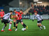 Derry City's Ben Doherty moves away from Dundalk right back Archie Davies. Photo by Kevin Moore.