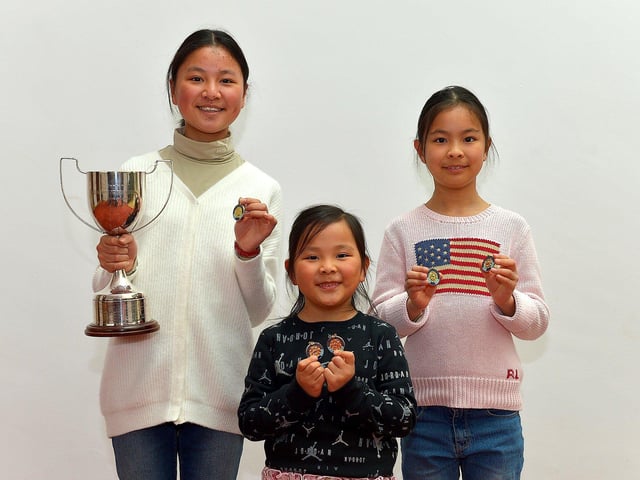 Maple Kong (left) and her sisters Michelle and Erin were placed first, in their age groups for Piano at the Feis Dhoire Cholmcille on Friday at the Millennium Forum. Photo: George Sweeney.  DER2315GS – 202 