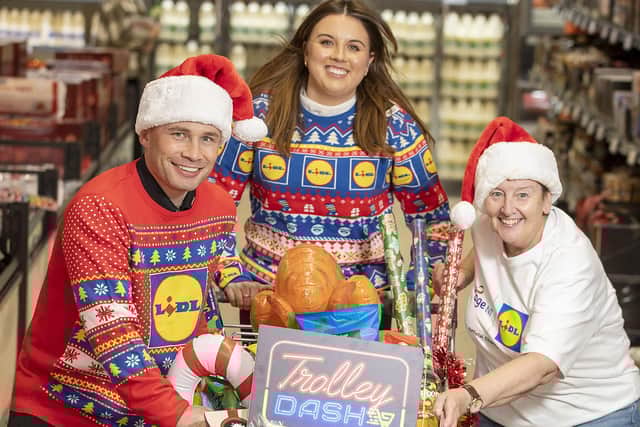 L-R: Carl Frampton; Lidl NI Sales Operation Director, Sarah McKenna; Age NI Chief Executive, Linda Robinson BEM;