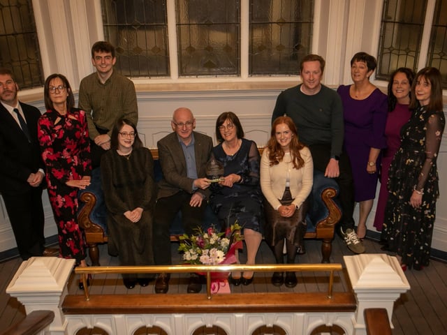 Retiring Derry Credit Union Chief Executive Officer Joan Gallagher pictured with members of her family at Friday night's function in the Bishop's Gate Hotel, Derry.