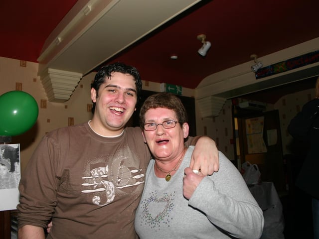 James Doolin enjoys a joke with his Godmother Kathleen at the 21st party. 2123/dd