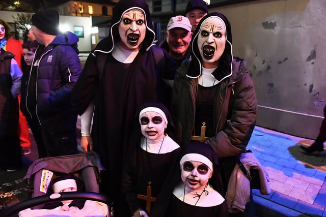 Spectators pictured at the Halloween parade.  Photo: George Sweeney