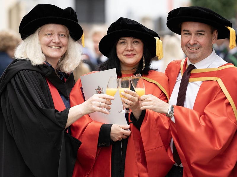 Professor Elizabeth Cooke, Professor of Museum Studies at Ulster University; Dr Adriana Valderramalopez, graduating with a Doctorate in Heritage and Museum Studies; Dr Philip McDermott, Senior Lecturer in Sociology at Ulster University pictured at graduations on Monday July 8.   (Photo: Nigel McDowell / Ulster University)