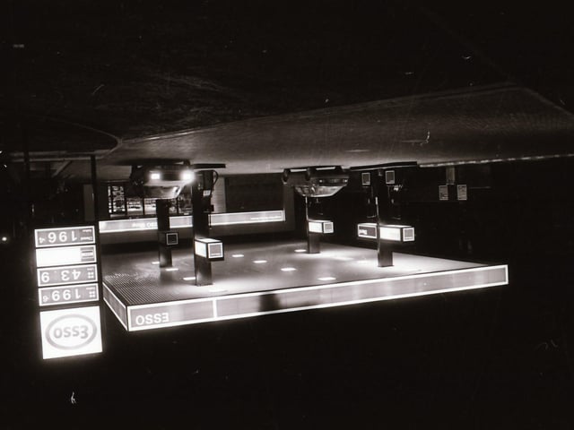The Esso Garage at night.