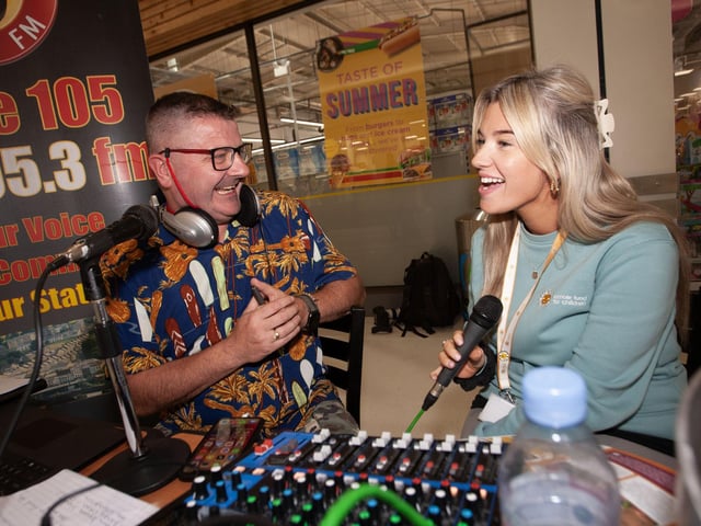 Drive 105's Tony McBride interviewing Molly Watson, Cancer Fund for Children fundraiser during an Annual Charity Event at Lisnagelvin Shopping Centre.