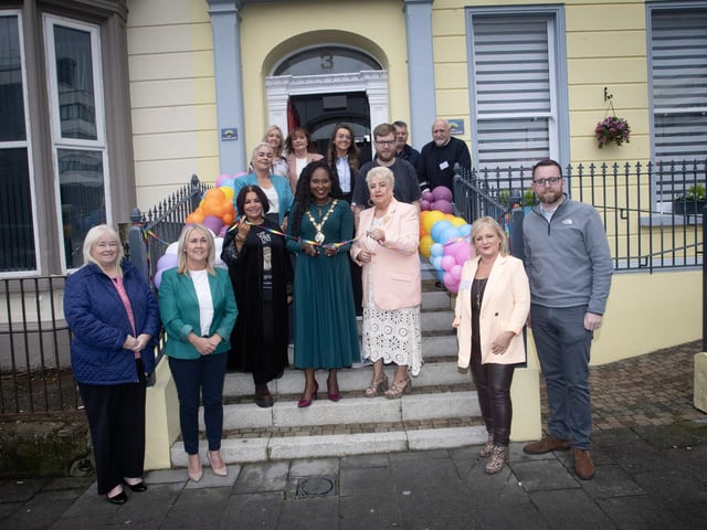 NEW HURT PREMISES. . . .The Mayor of Derry City and Strabane District Council, Lillian Seenoi-Barr cuts the ribbon to officially open the new HURT premises at 3 Bayview Terrace, Derry on Friday morning last. (Photos: Jim McCafferty Photography)
