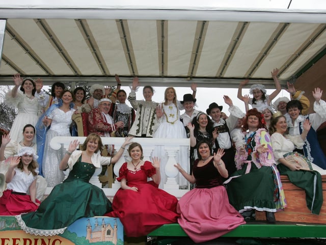 Buncrana pantomine cast all smiles for the camera. (1803C28a) : St Patrick's Day Buncrana 2005.