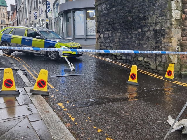 A police car blocks access to Butcher Street.