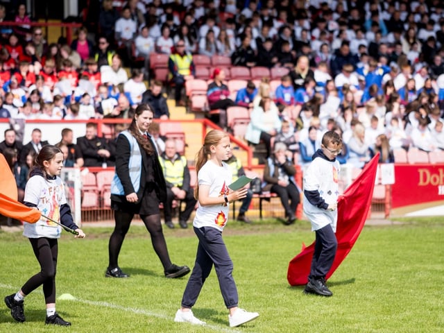 Participants at the Derry Diocese Fan The Flame annual Mass 2025 in Celtic Park.