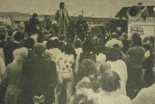 Glen Barr addressing a rally in Irish Street.