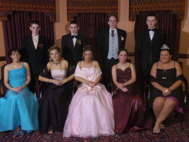 Seated, from left, Yvonne McLaughlin, Kelly Doherty, Rachael Farrell, Kathleen Rodden, and Bridgeen Grant. Standing, from left, Christopher O'Donnell, Chuck O'Donnell, Dominic McGlynn, and Lee Stones. (1801PG17) : Scoil Mhuire Formal in January 2005.