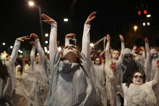 Ghosts are a regular feature of Derry's Halloween, here depicted in a previous Halloween Street Carnival Parade. (Photo by Lorcan Doherty)