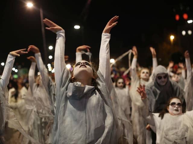 Ghosts are a regular feature of Derry's Halloween, here depicted in a previous Halloween Street Carnival Parade. (Photo by Lorcan Doherty)